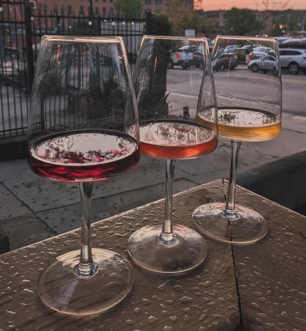Three wine glasses at Aperitivo